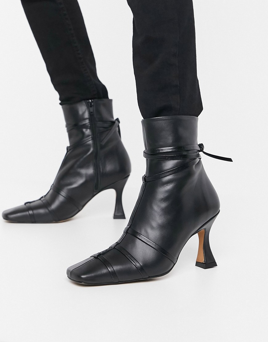 Boots by ASOS DESIGN Two reasons to add to bag Zip-side fastening Strappy details Square toe Shaped 