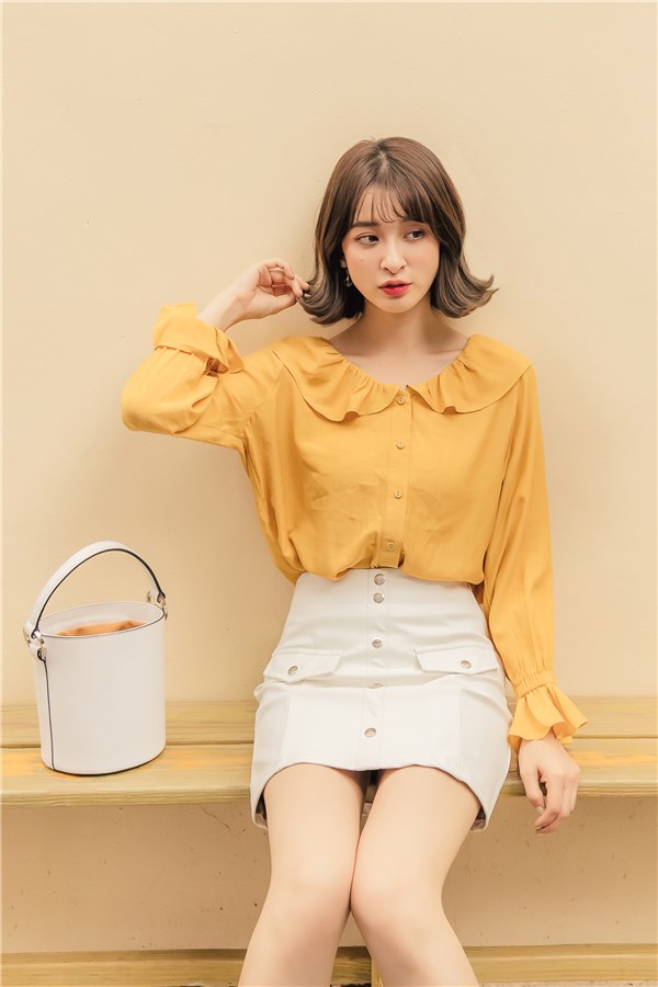 荷葉領片，鬆緊荷葉袖設計/無內裡 *商品顏色因電腦螢幕設定差異會略有不同，請以實際商品為準