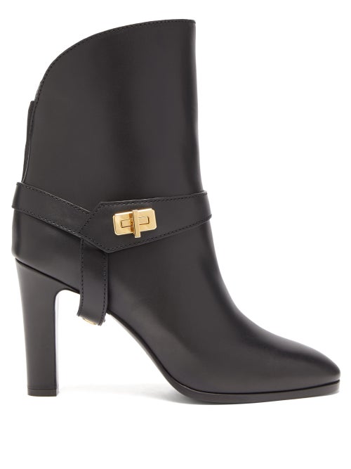 Givenchy - Equestrian codes inform Givenchy's black Eden boots, which feature a detachable strap tha