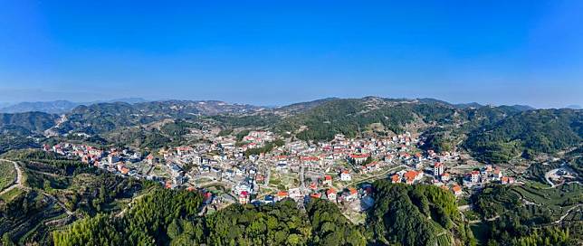 An aerial drone photo taken on Jan. 26, 2024 shows a view of Junying Village in the city of Xiamen, southeast China's Fujian Province. (Photo by Yang Jinfu/Xinhua)