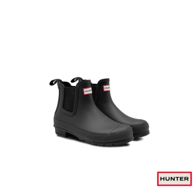 以天然硫化橡膠，純手工製作 聚酯襯裡，防水 啞光鞋面，有彈性側邊和尼龍拉帶 橡膠鞋底印有Hunter壓紋