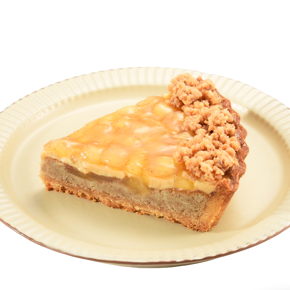 使用新鮮青蘋果，熬煮出蘋果獨特的酸味與爽脆的口感，加上優質錫蘭肉桂粉提味，香氣在尾韻輕飄散出來。夢想村-肉桂蘋果派6吋內容物：杏仁奶油塔/杏仁奶油餡/錫蘭肉桂/卡士達/蘋果丁/巧克力酥菠蘿規格：6吋/