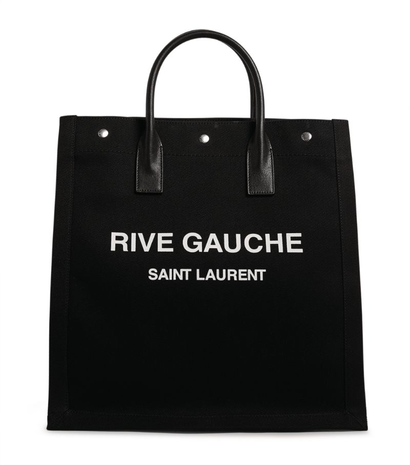 This structured tote from Saint Laurent pays homage to the labels heritage, referencing its Rive Gauche ready-to-wear line named after the bohemian left bank of the Parisian river Seine. Crafted in soft cotton and trimmed with supple leather, this easy-to-style piece epitomises the chic appeal and practicality of the classic ladylike bag.