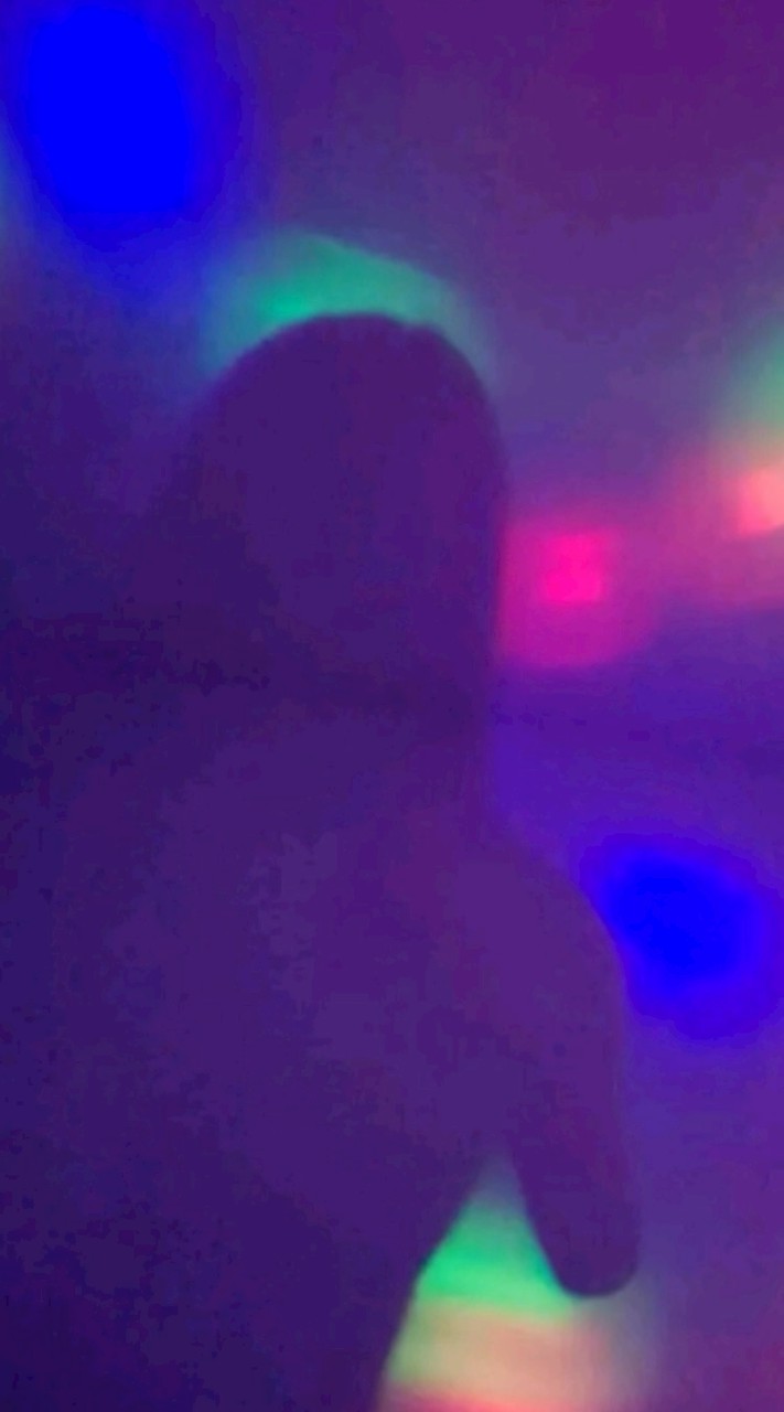 T.