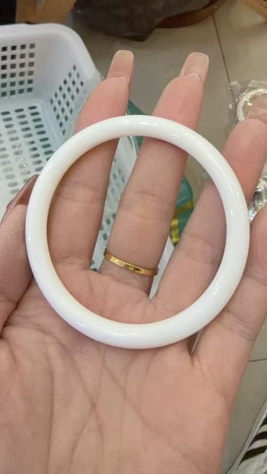 米奇裳翡晶