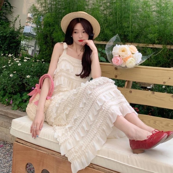洋裝 夏季新款設計感小眾別致吊帶連身裙韓系氣質綁帶溫柔長款裙子洋裝