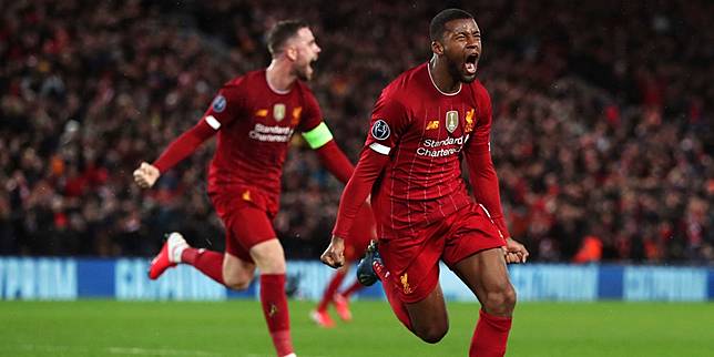 Gelandang Liverpool, Georginio Wijnaldum merayakan golnya ke gawang Atletico Madrid. (c) AP Photo