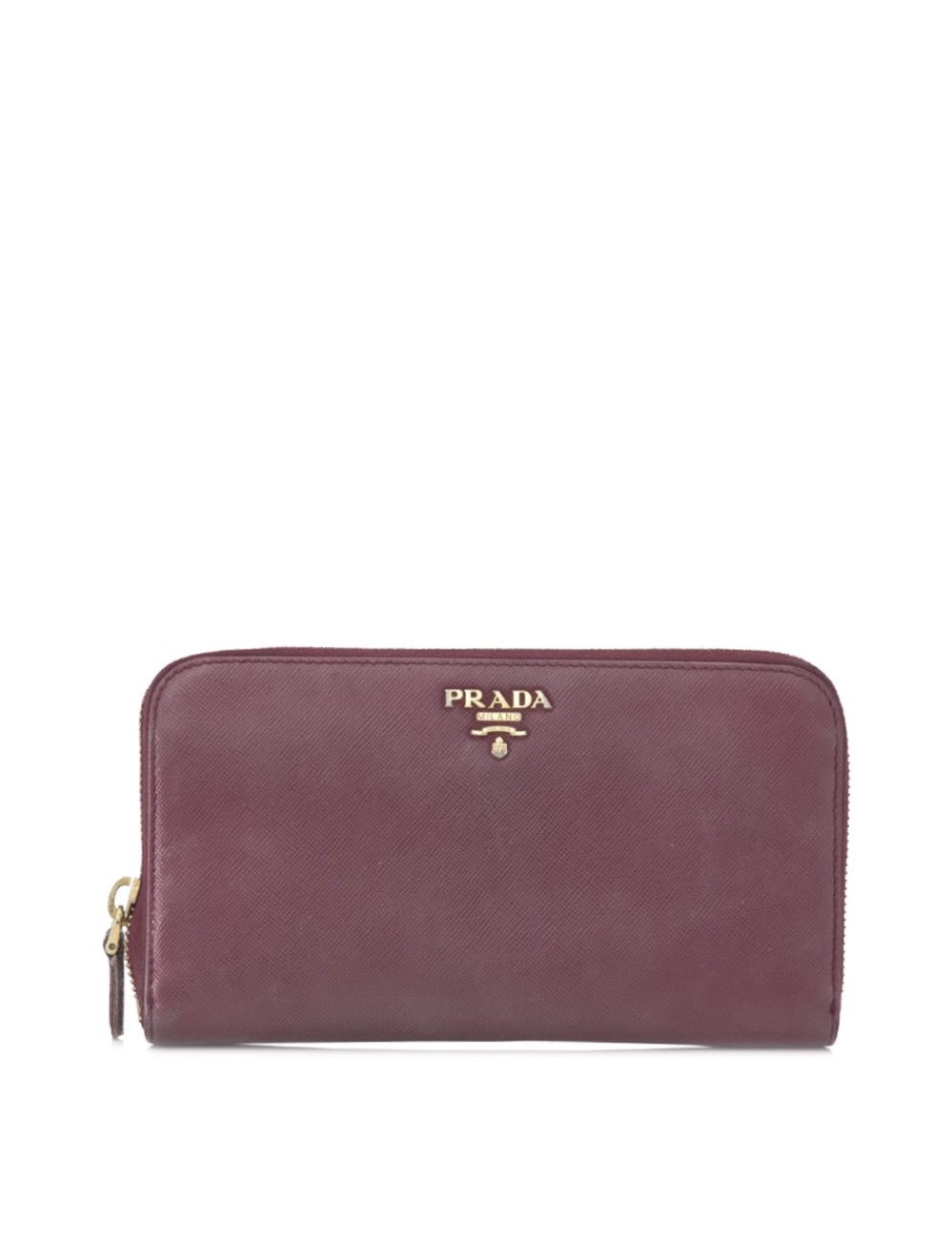 Exterior - Saffiano leather - Gold tone hardware - Zip around closure - Raised designer lettering In