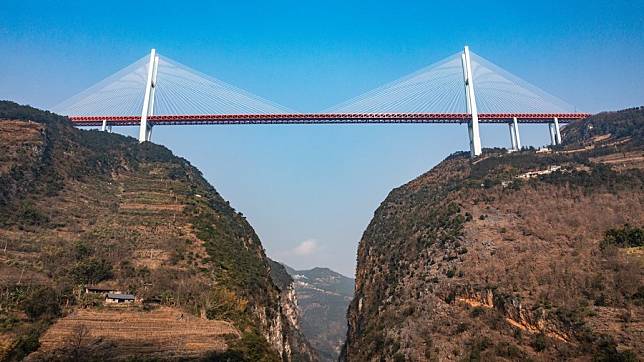 Xinhua Headlines: Bridges bring benefits to China's mountainous ...