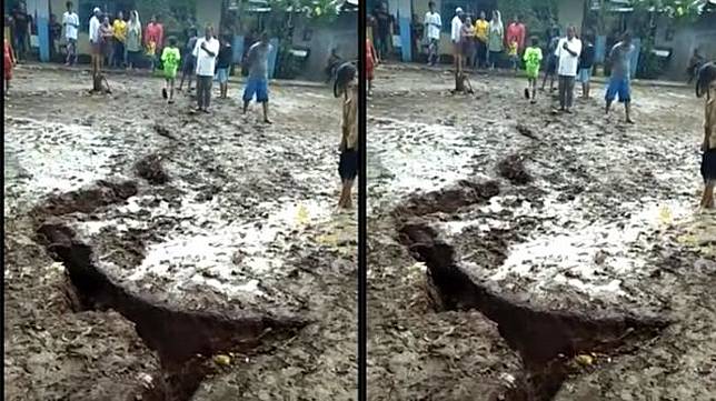 Warga Kelurahan Cisalak Pasar, Kecamatan Cimanggis, Depok, Jawa Barat, geger melihat fenomena tanah terbelah seusai hujan. [Suara.com/Supriyadi]