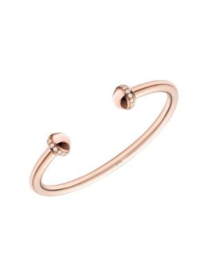 A voluptuous rose gold bangle bracelet brings the daily ritual of the Possession ring to the wrist. 