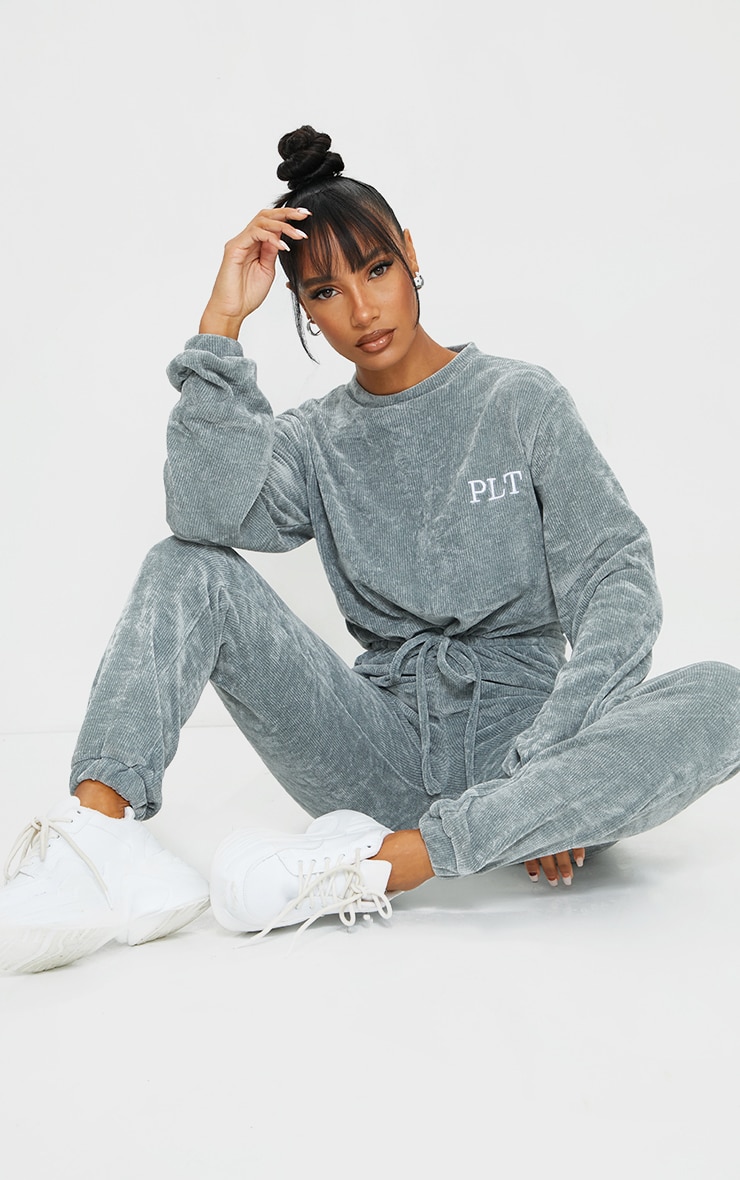 PRETTYLITTLETHING Dark Grey Embroidered Rib Velour Crew Neck Jumpsuit nWe are obsessing over this ju