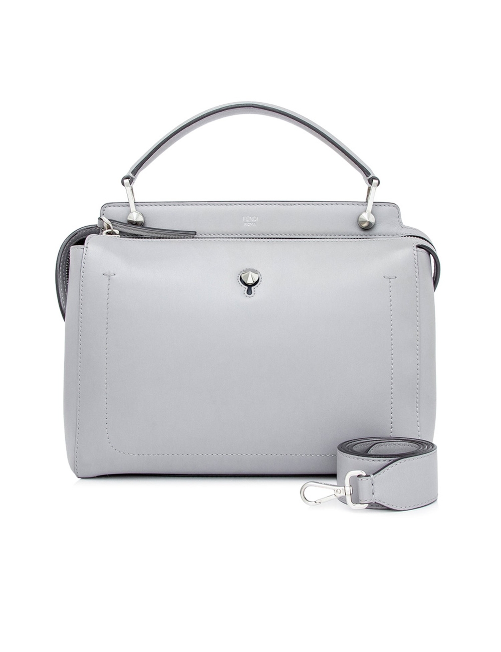 The DotCom features a leather body, a flat leather top handle, a detachable flat leather strap, a to