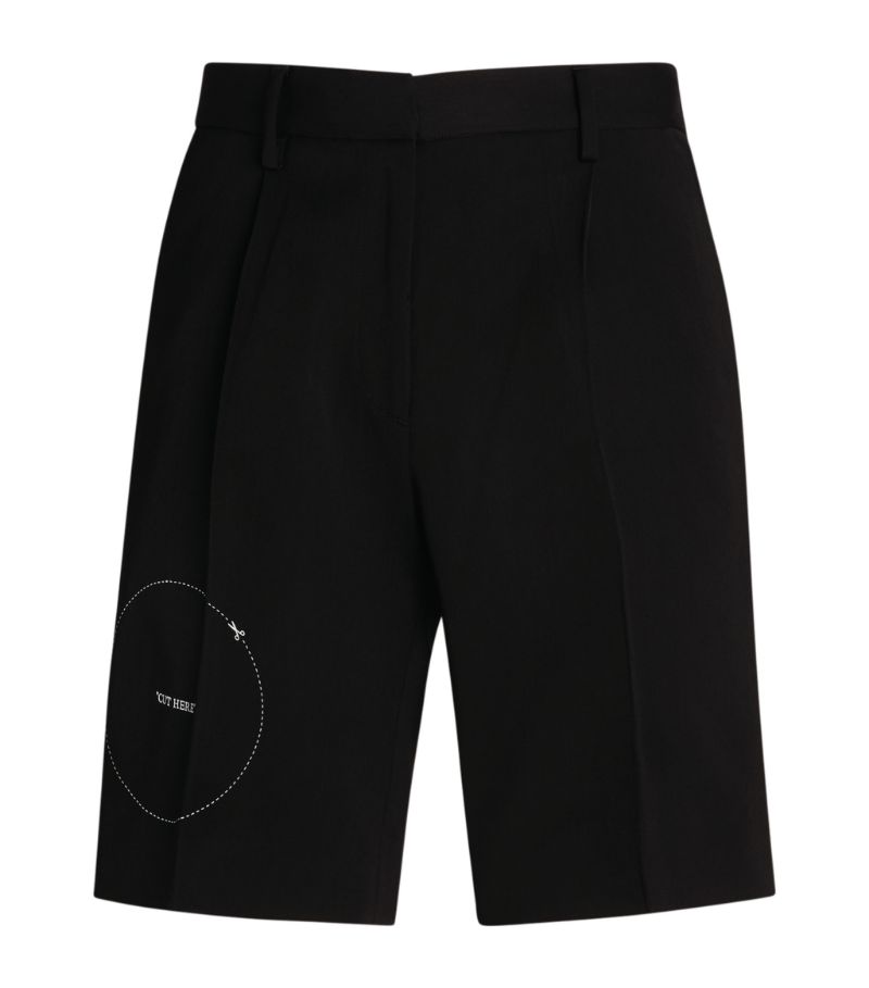 Elevating a simple silhouette with an innate Off-White design feature, these tailored shorts feature