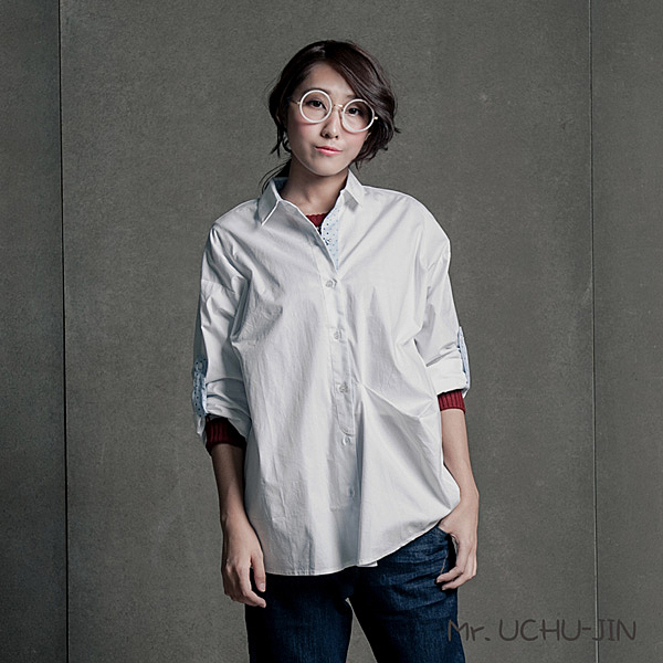 百貨專櫃女裝n彩色鈕釦排列n前襟活褶設計n正式帶有趣味