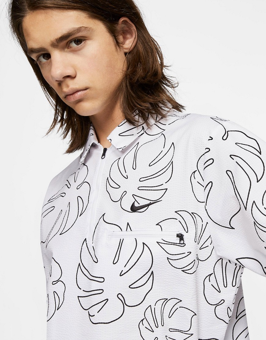 Polo shirt by Nike Skateboarding Current aesthetic All-over leaf print Polo collar Partial zip faste