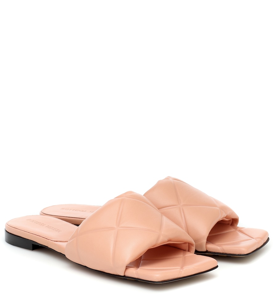 Bottega Veneta's BV Rubber Lido slides are defined by quilted Nappa leather straps across the vamp.