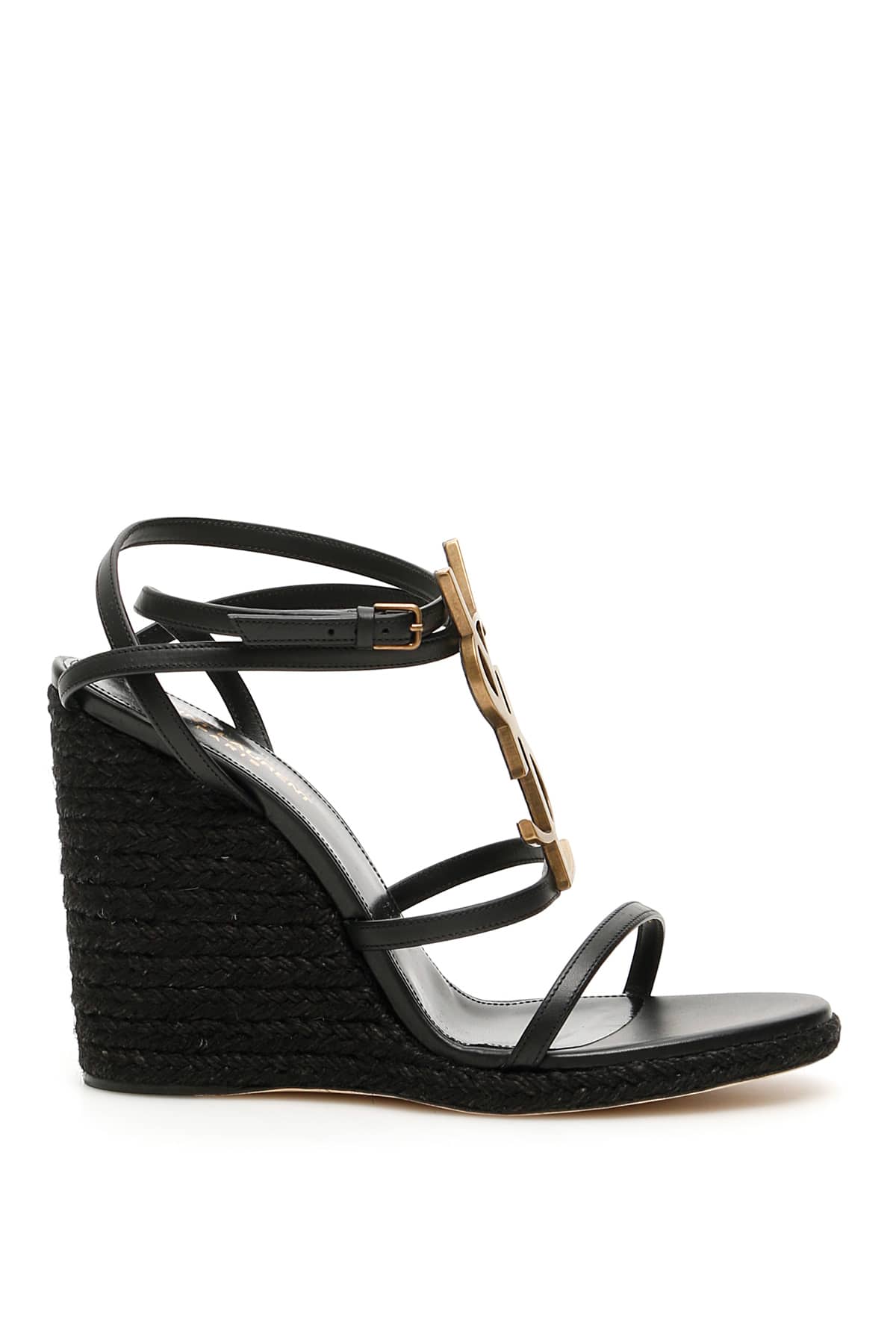 Saint Laurent leather sandals with the iconic antique gold-tone YSL monogram on the front. Ankle str