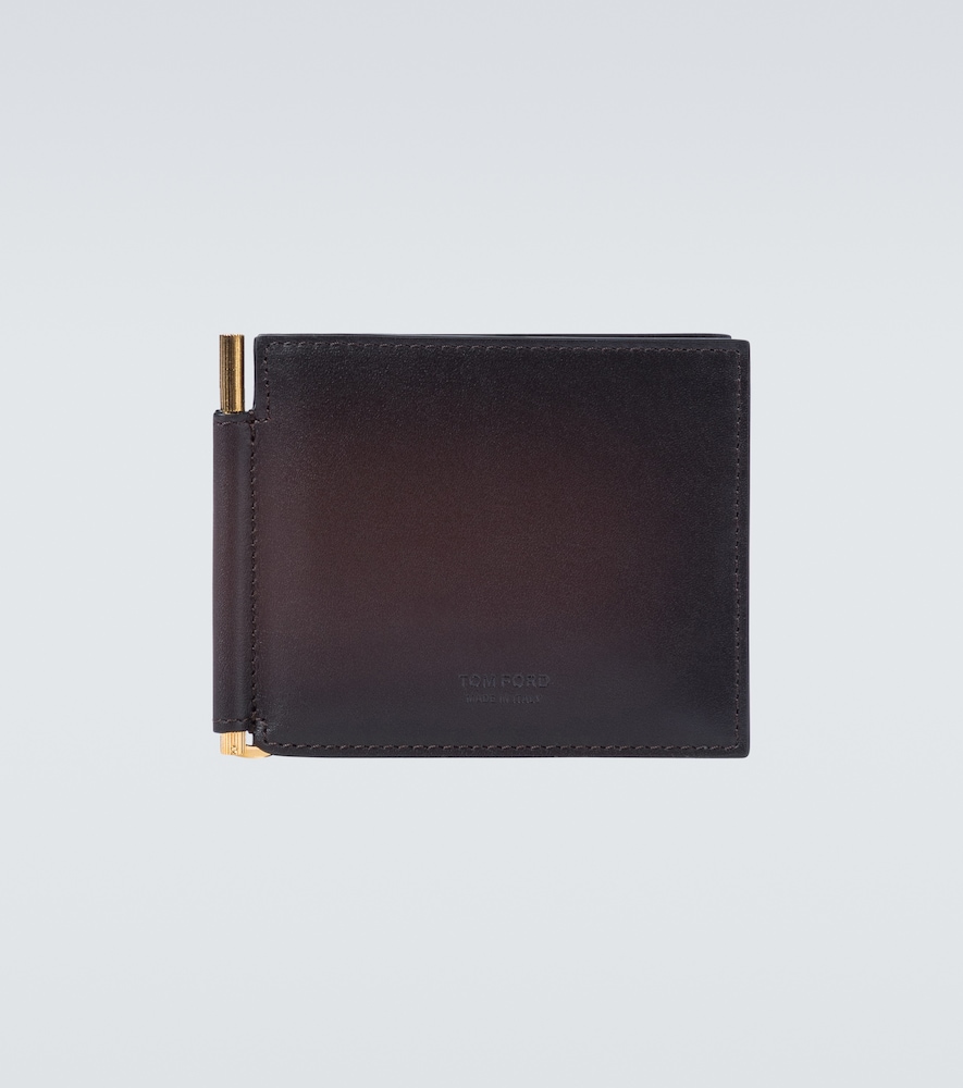 This brown bifold wallet from Tom Ford is crafted in Italy from grained leather featuring the label'