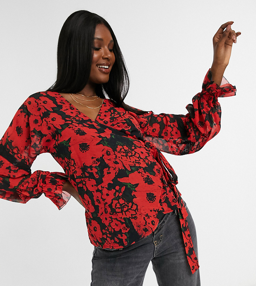 Maternity top by Hope and Ivy Maternity Cute top All-over floral print V-neck Wrap front Long sleeve