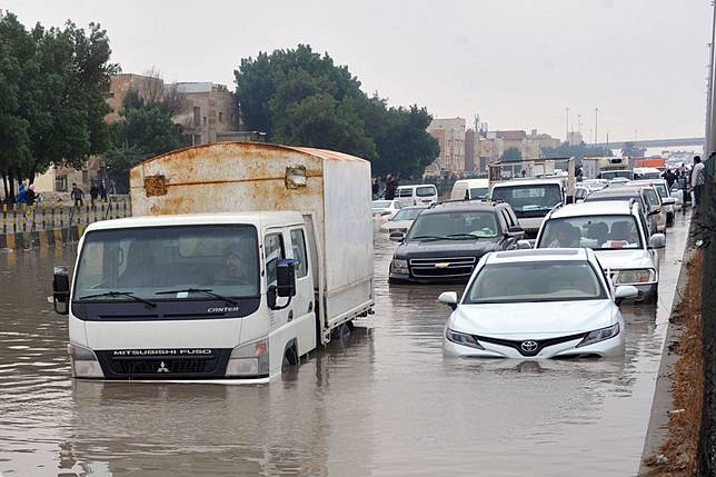 Mideast in Pictures: Heavy rain hits Kuwait as New Year rings in ...