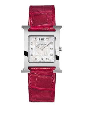 From the Heure H Collection. Signature H-shaped case with diamond-set dial on a red alligator strap.