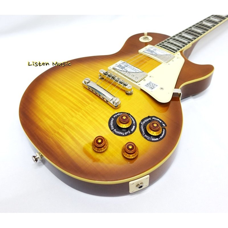 Epiphone Les Paul Standard Plus TopHoney Blue （蜂蜜漸層色）琴身：桃花心木面板：AAA虎紋楓木琴頸：桃花心木Hand-set指板：玫瑰木琴頸拾音器：Pro