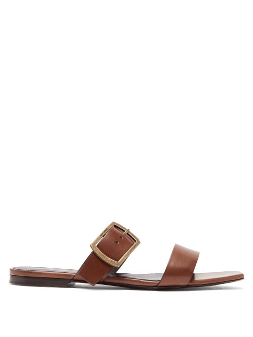 Saint Laurent - The streamlined design of Saint Laurent's brown sandals channel the contemporary fee