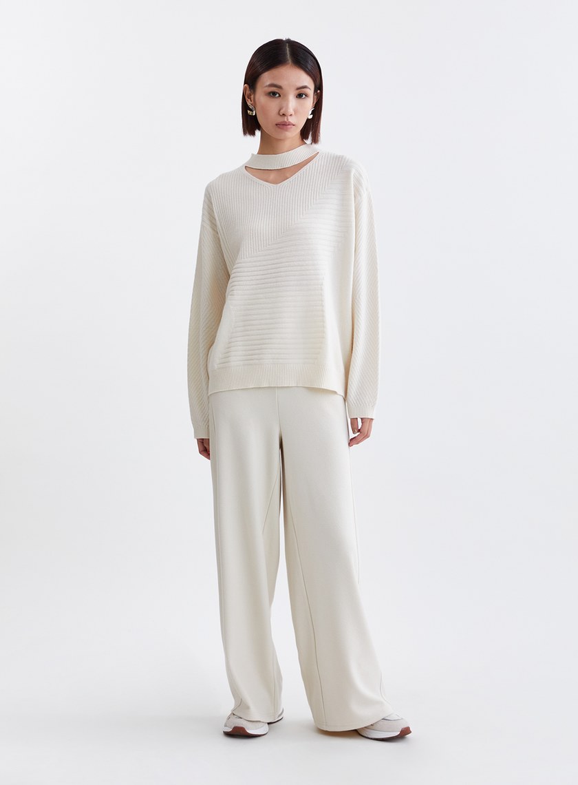 V型簍空不規則條紋針織上衣