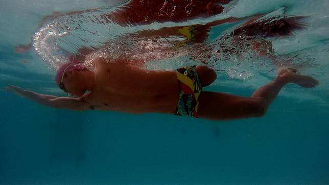 Jendi Panggabean sedang berlatih untuk persiapan Asian Para Games 2018 di Jakarta, Oktober mendatang. - BBC News Indonesia/Oki Budhi