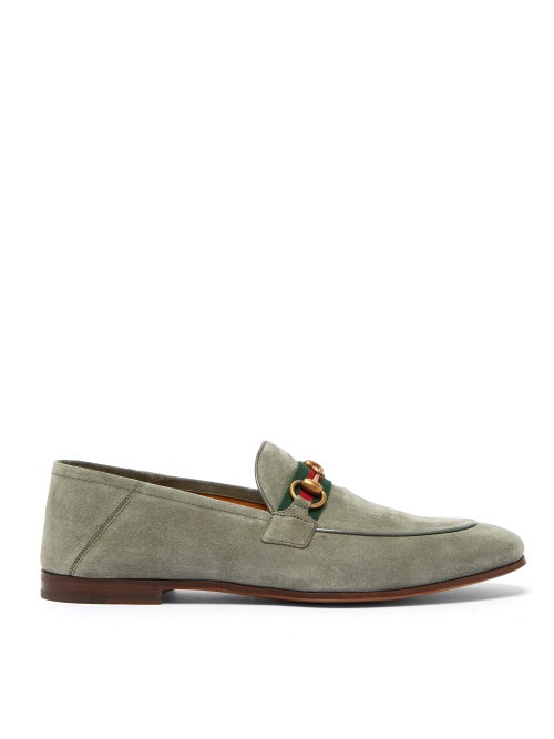 Gucci - Equestrian codes inform Gucci's grey suede Brixton loafers, which are hallmarked with the ho