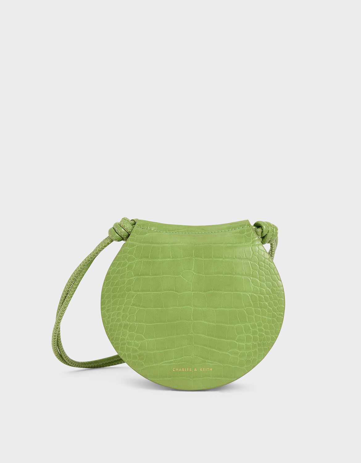 帶點清新甜美的鱷魚紋小包，如同初入社會的小資女性，溫柔婉約卻能隱約展現自信魅力。