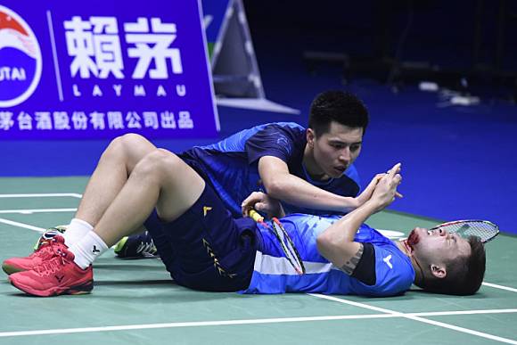 Bloo d Malaysia exit Sudirman Cup after freak injury