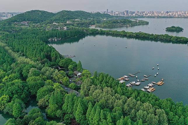 HANGZHOU, CHINA - MAY 26, 2021 - An aerial view of a giant Louis Vuitton  bag by the West Lake in Hangzhou, capital of east China's Zhejiang  Province, May 26, 2021. Organizers