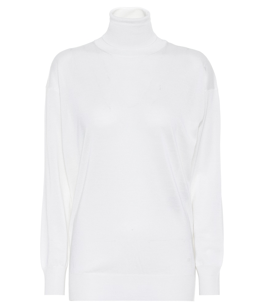 Classic styles like this white turtleneck sweater from Tom Ford will form the anchor of your cold-we