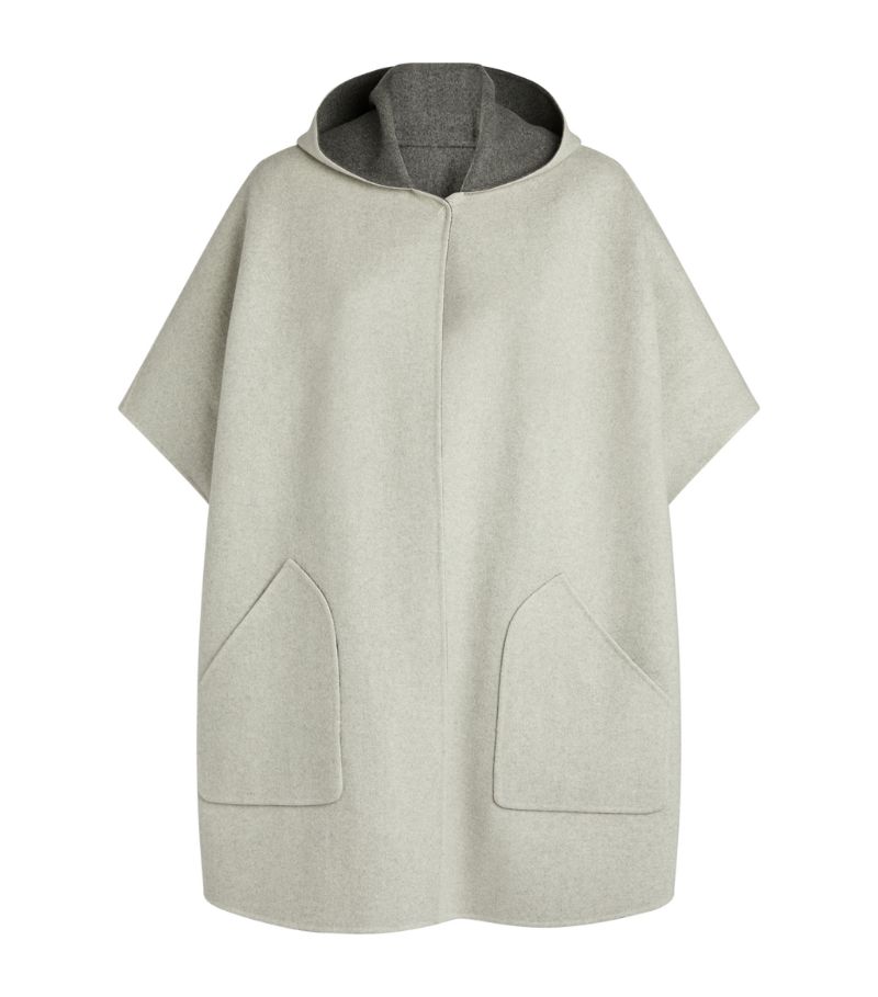 Cloaking you in the outerwear equivalent of a soft embrace, Loro Pianas Carlene cape exhibits the la