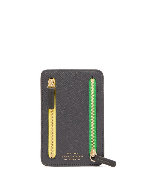 Smythson - Look to Smythson's navy Panama currency case for a refined way to keep money organised on