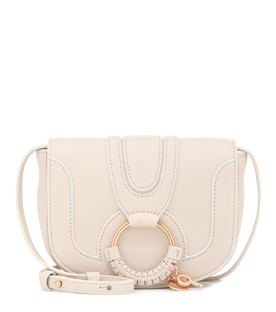 Add a pretty accent to your accessories rotation with the dainty Hana Mini shoulder bag from See By