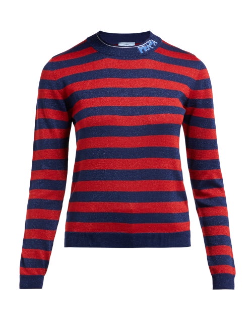 Prada - Look to Prada for statement knitwear that is ideal for everyday looks, such as this red and 