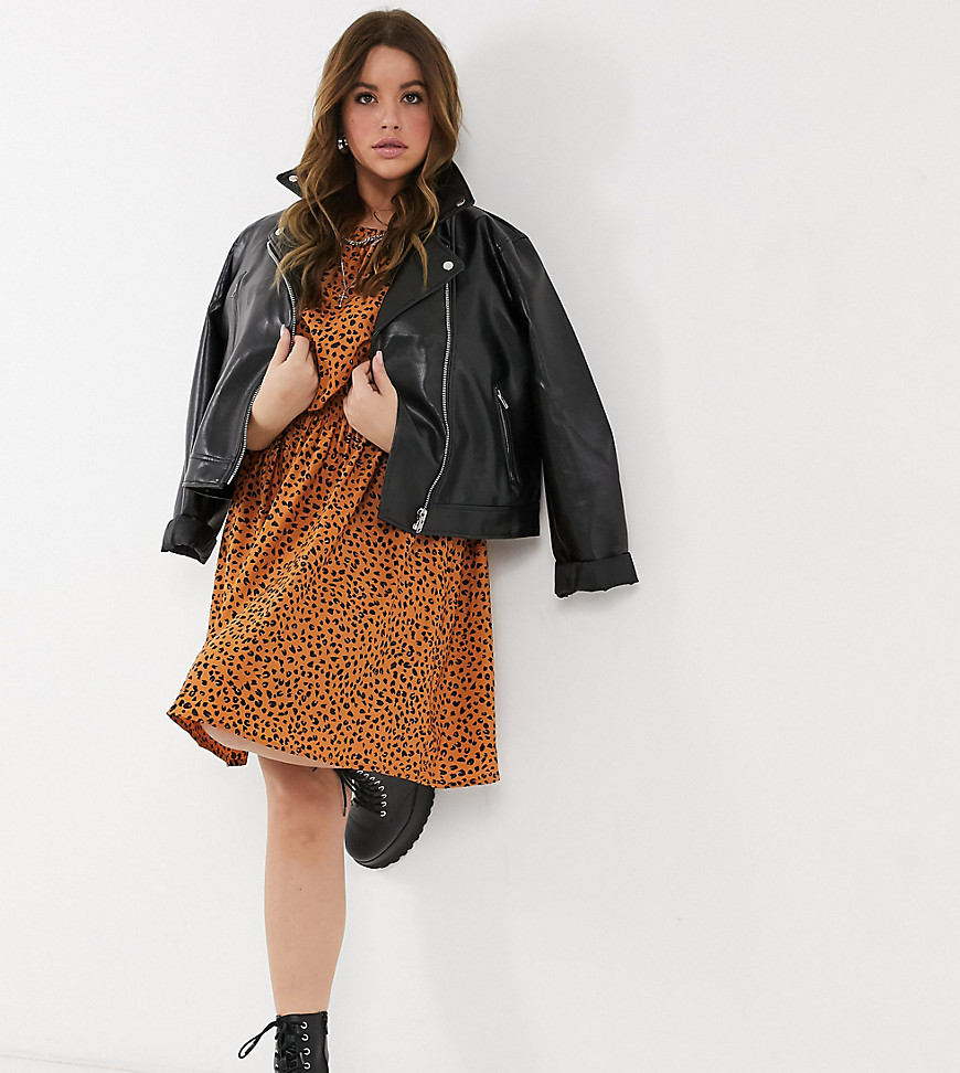 Plus-size dress by New Look Crack the dress code All-over animal print Round neck Short sleeves Shir