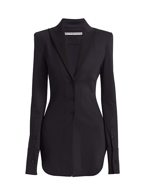 This elegant long-line shirt jacket is cut with a tuxedo-inspired peak lapels and a plunging V-neckl
