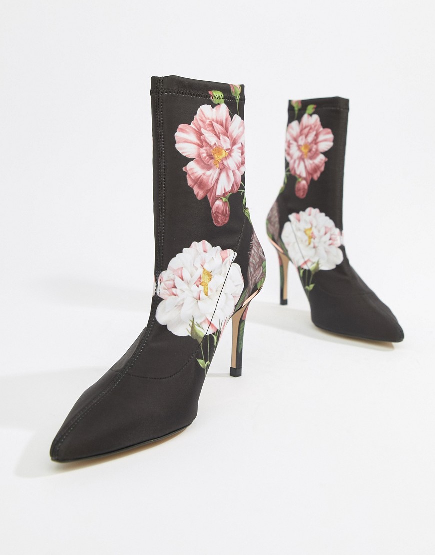 Boots by Ted Baker They've already got your attention Signature floral print Pull-on style Stretchy,