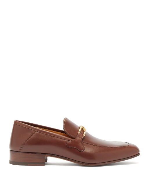 Gucci - Gucci's brown leather Phyllis loafers are embellished with the house's reinterpreted horsebi