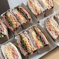EARN EATING SANDWICH