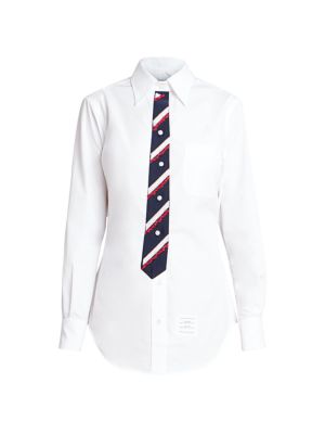 This classic button down point collar shirt is accented with a trompe l'oeil embellished necktie giv