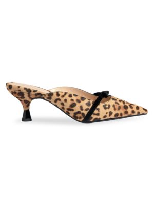 A elongated point toe and sweet kitten heel heighten the curvaceous silhouette of these bow-trimmed 