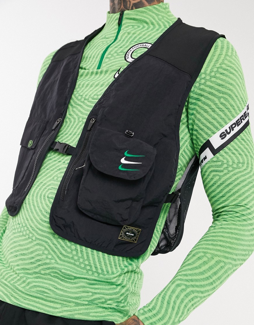 Vest by Nike This item is excluded from promo Open front Sleeveless style Buckle fastening Zip and u