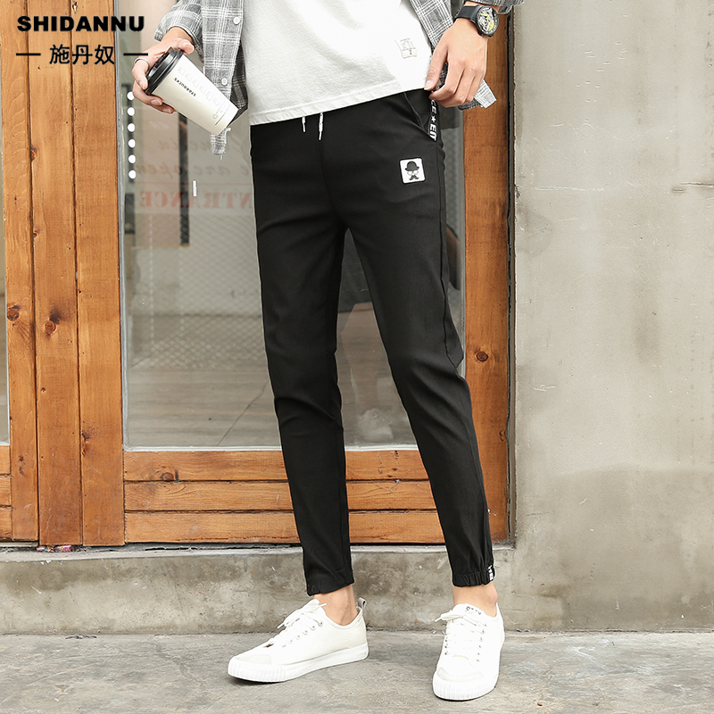 商品詳情材質: 棉-+聚酯纖維尺碼: M L XL 2XL腰型: 中低腰顏色: 黑色服裝版型: 修身褲長: 長褲款式: 錐形褲褲腳口款式: 小腳————————————————————————小提醒：