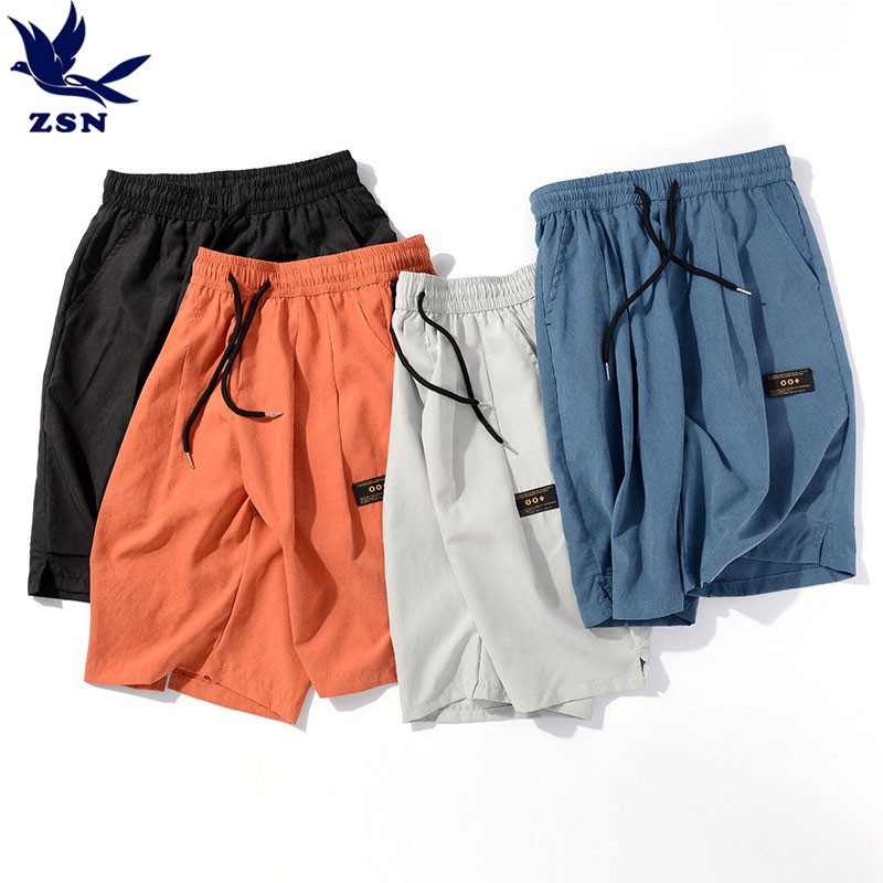 日系原創素面貼標休閒短褲 夏季薄款運動褲 寬鬆大碼五分褲 潮流百搭寬褲 港風顯瘦直筒褲 青春流行沙灘褲 嘻哈免燙膝上短褲