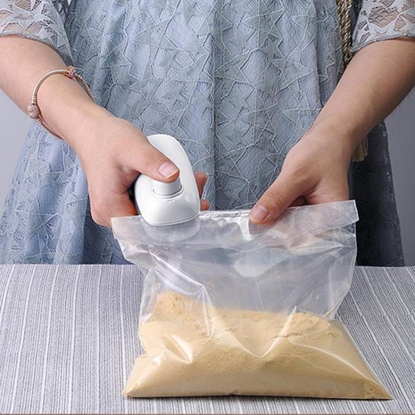 飛比便攜封口機加熱迷你微型手壓式食品包裝袋封口器零食袋密封器